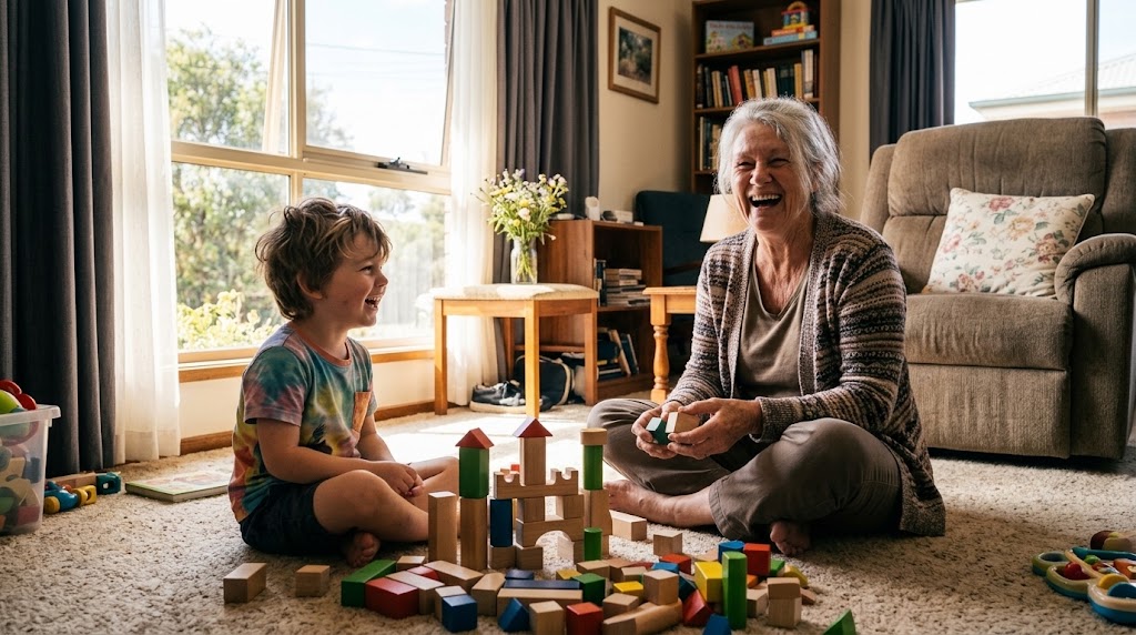 Grandmother playing on the floor with her grandson
